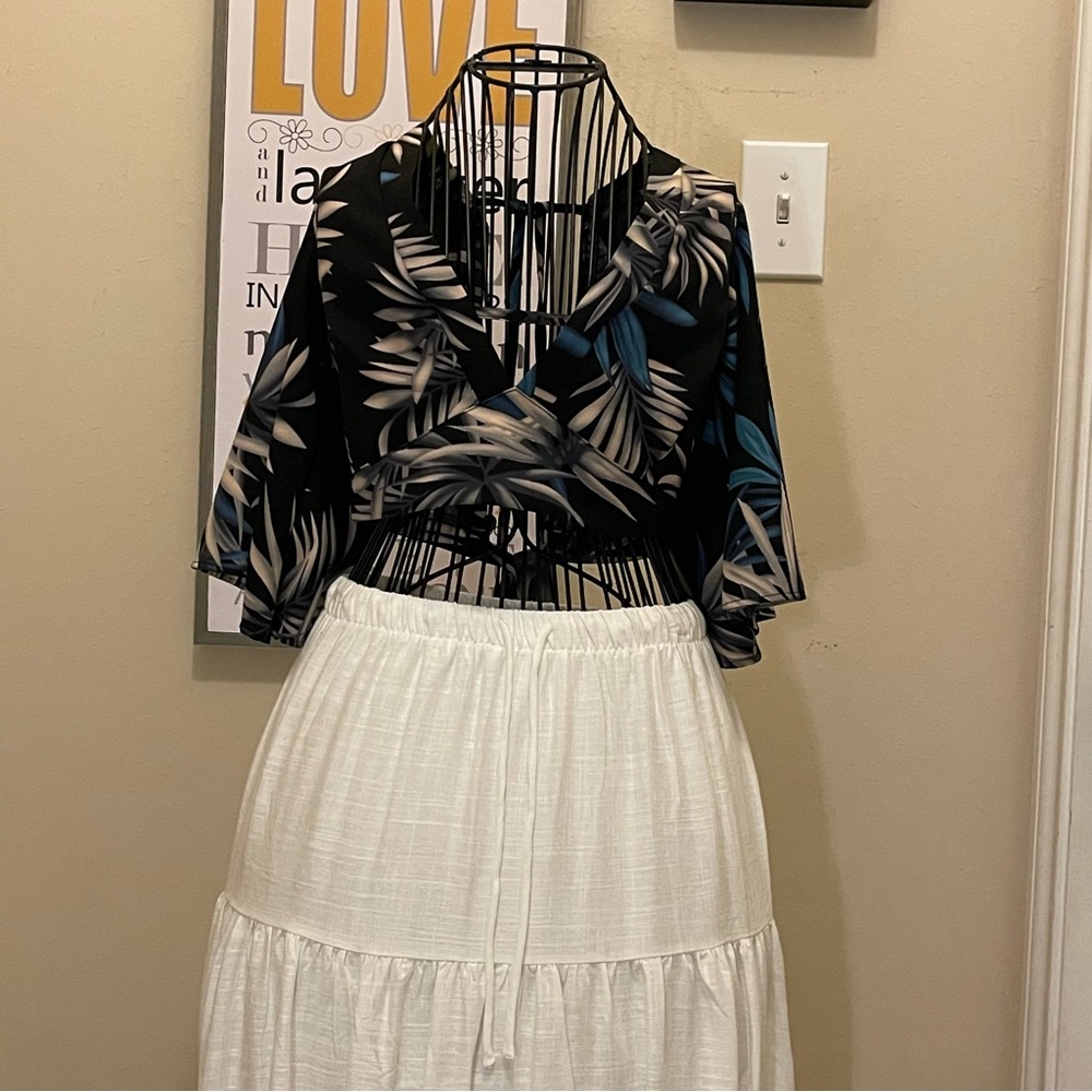Black and Blue Leaf Print Top with White Skirt